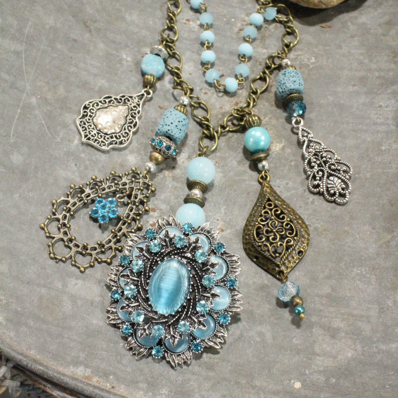 Embellishments Of Bronze & Silver Charming Blue Pendant Layered Necklace