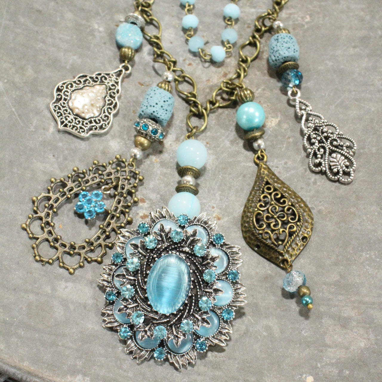 Embellishments Of Bronze & Silver Charming Blue Pendant Layered Necklace