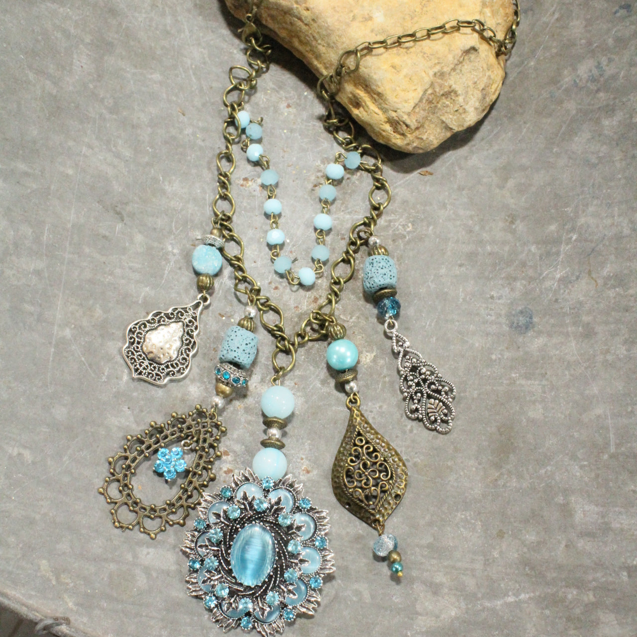 Embellishments Of Bronze & Silver Charming Blue Pendant Layered Necklace