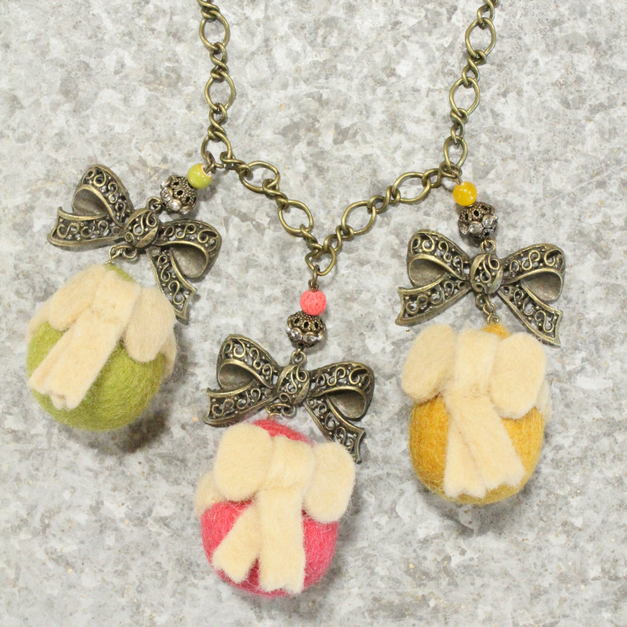 Bow Tie Beauties Egg Charming Necklace