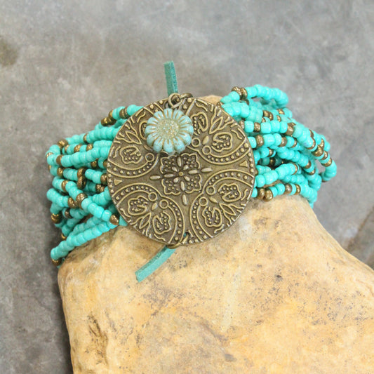 Glass Beaded Aqua Stretch & Buckle Bracelet With Czech Flower & Bronze Medallion Adornment