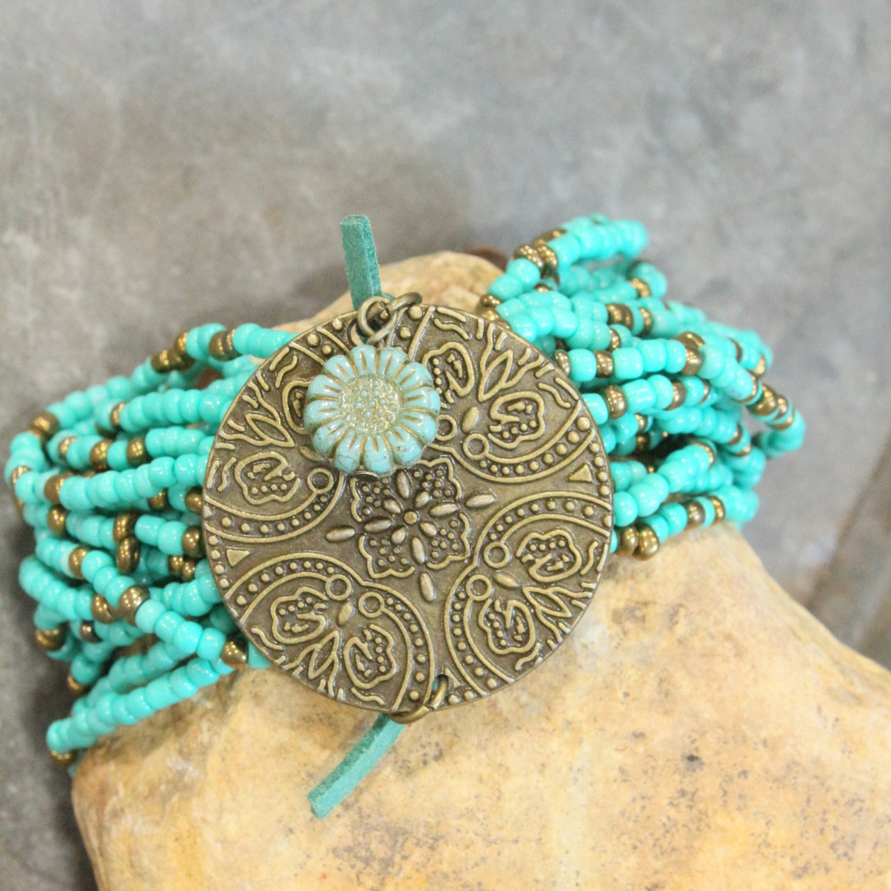 Glass Beaded Aqua Stretch & Buckle Bracelet With Czech Flower & Bronze Medallion Adornment