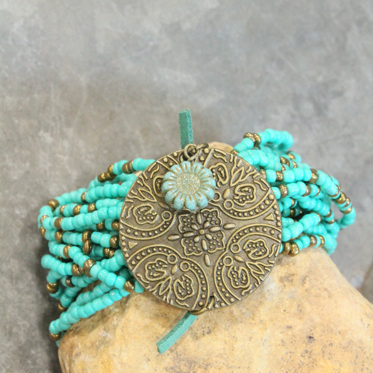 Glass Beaded Aqua Stretch & Buckle Bracelet With Czech Flower & Bronze Medallion Adornment