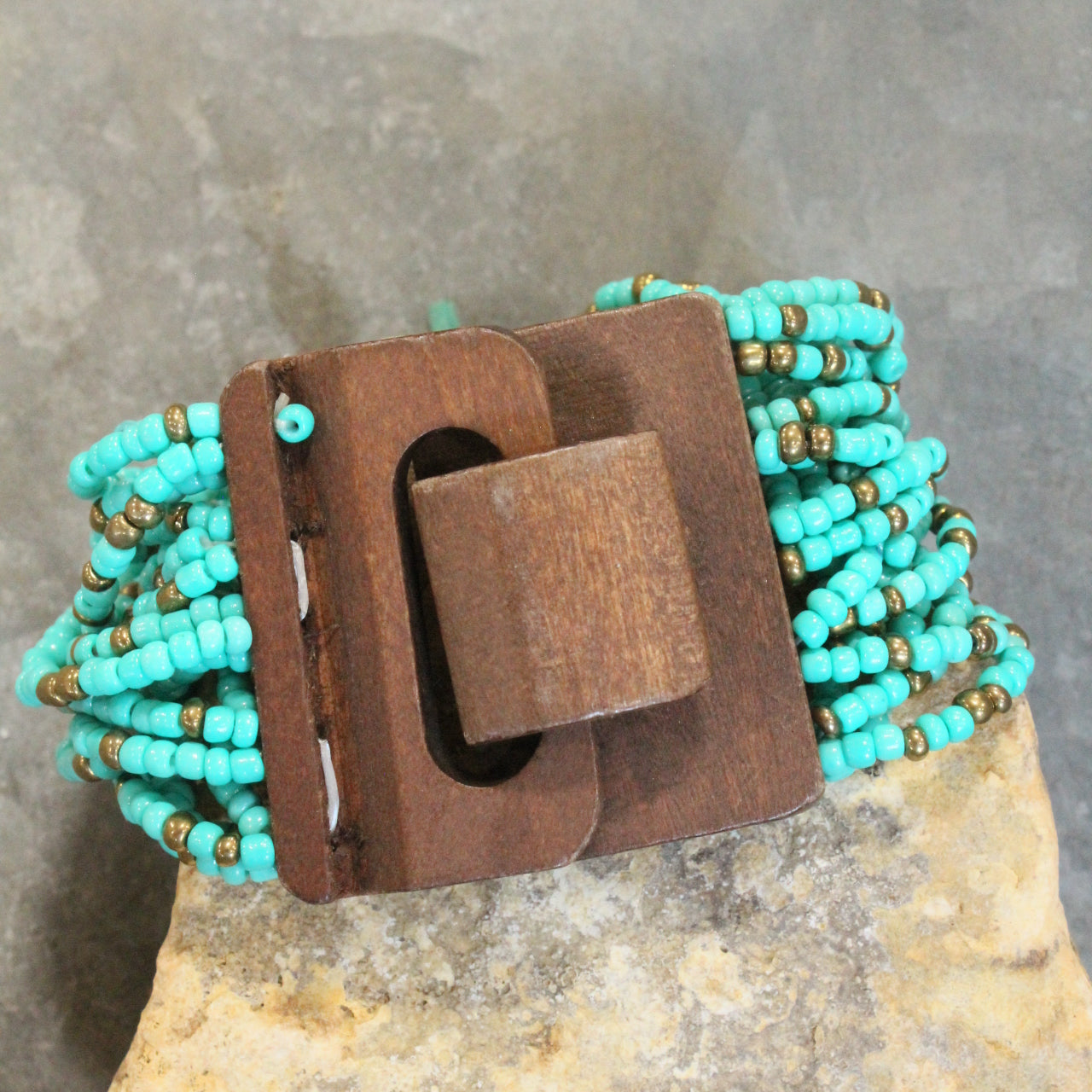 Glass Beaded Aqua Stretch & Buckle Bracelet With Czech Flower & Bronze Medallion Adornment