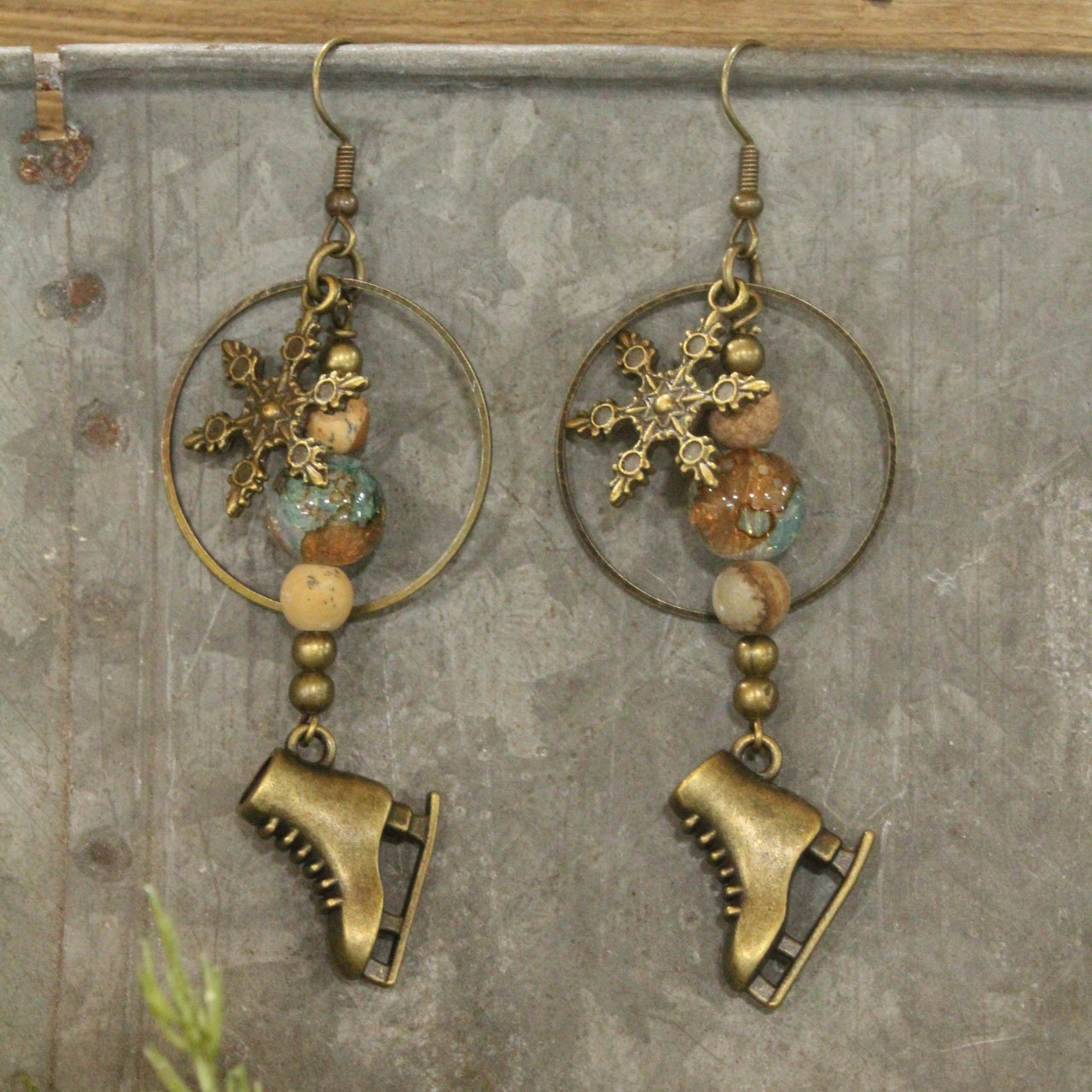 Ice Skating In The Snow Bronze Dangle Earrings