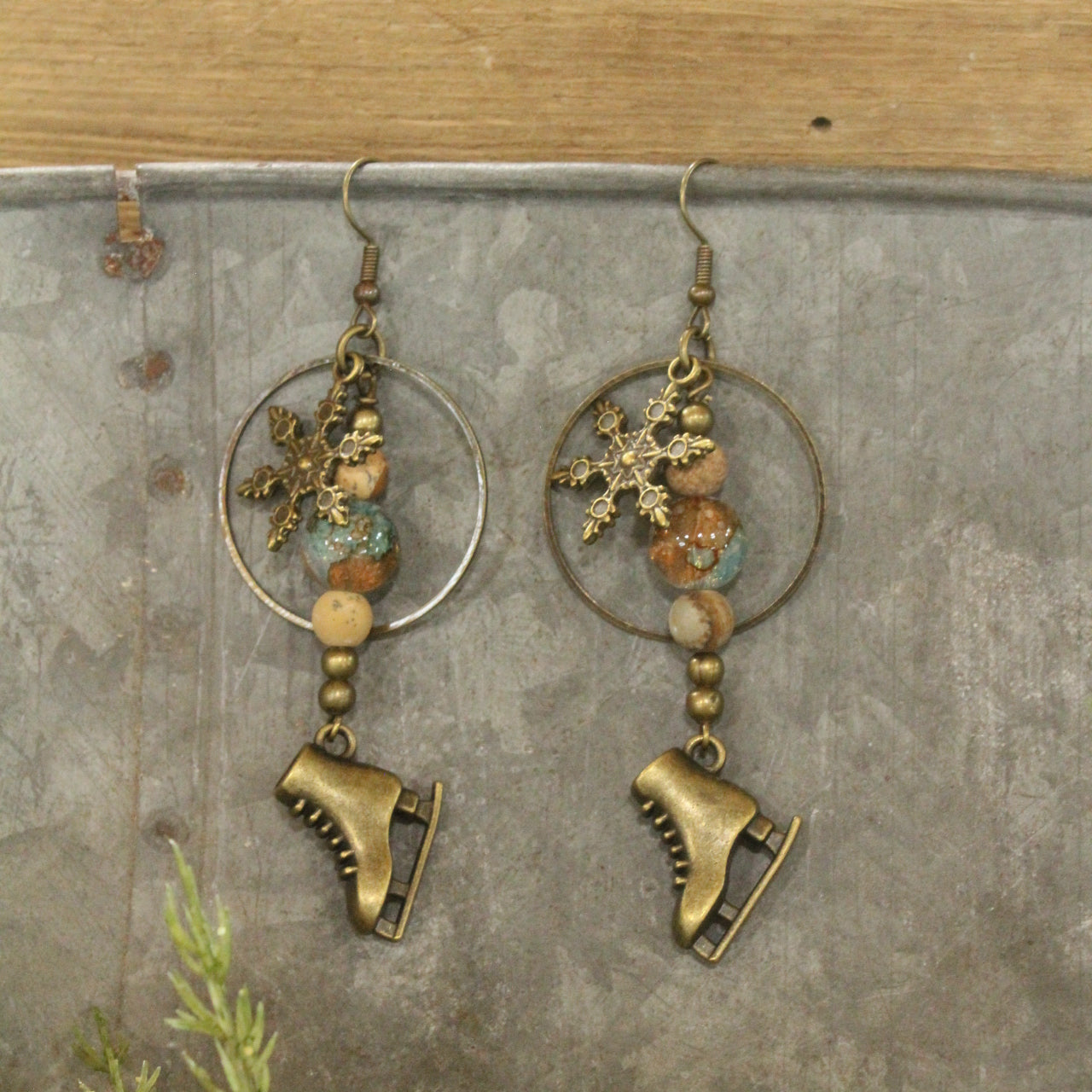 Ice Skating In The Snow Bronze Dangle Earrings