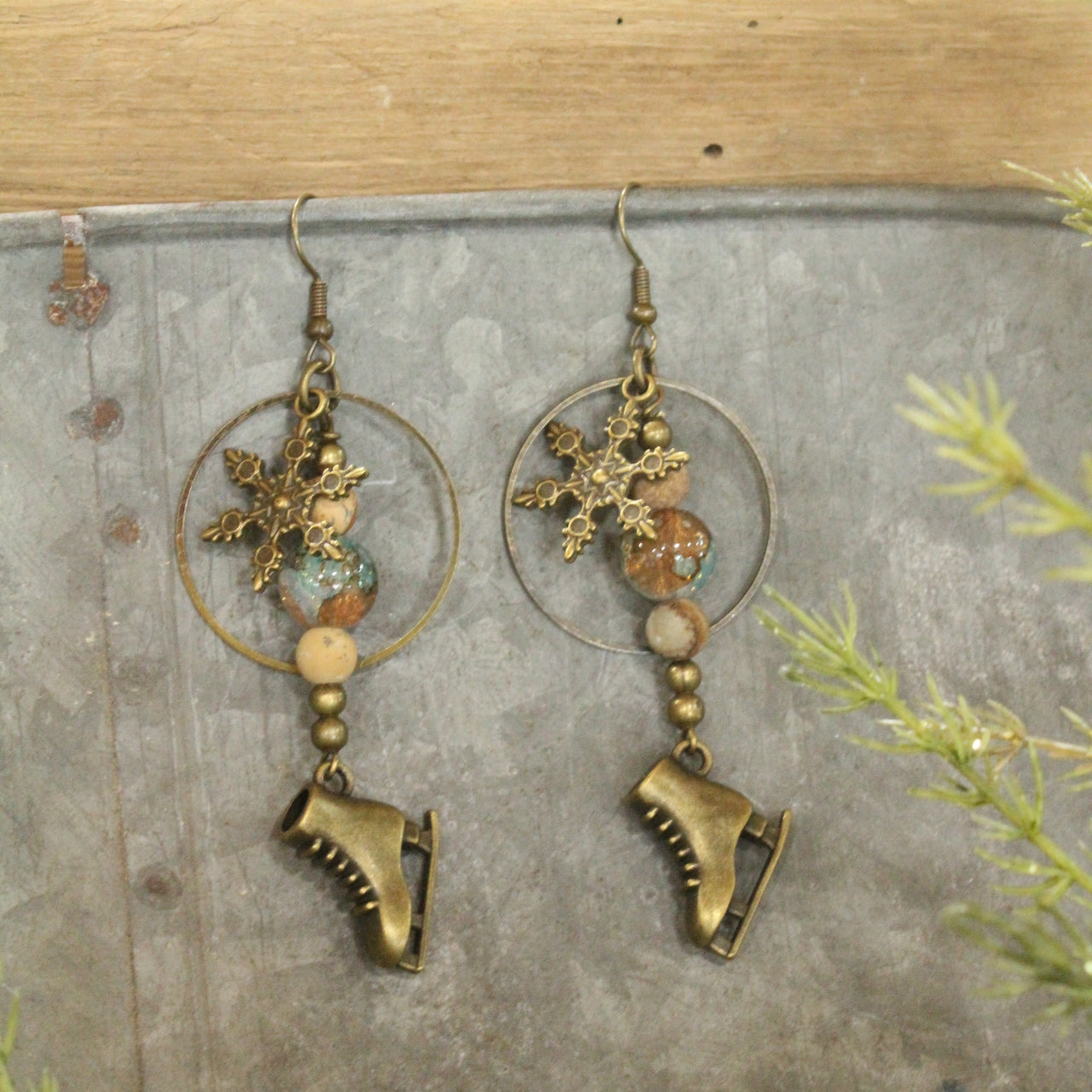 Ice Skating In The Snow Bronze Dangle Earrings