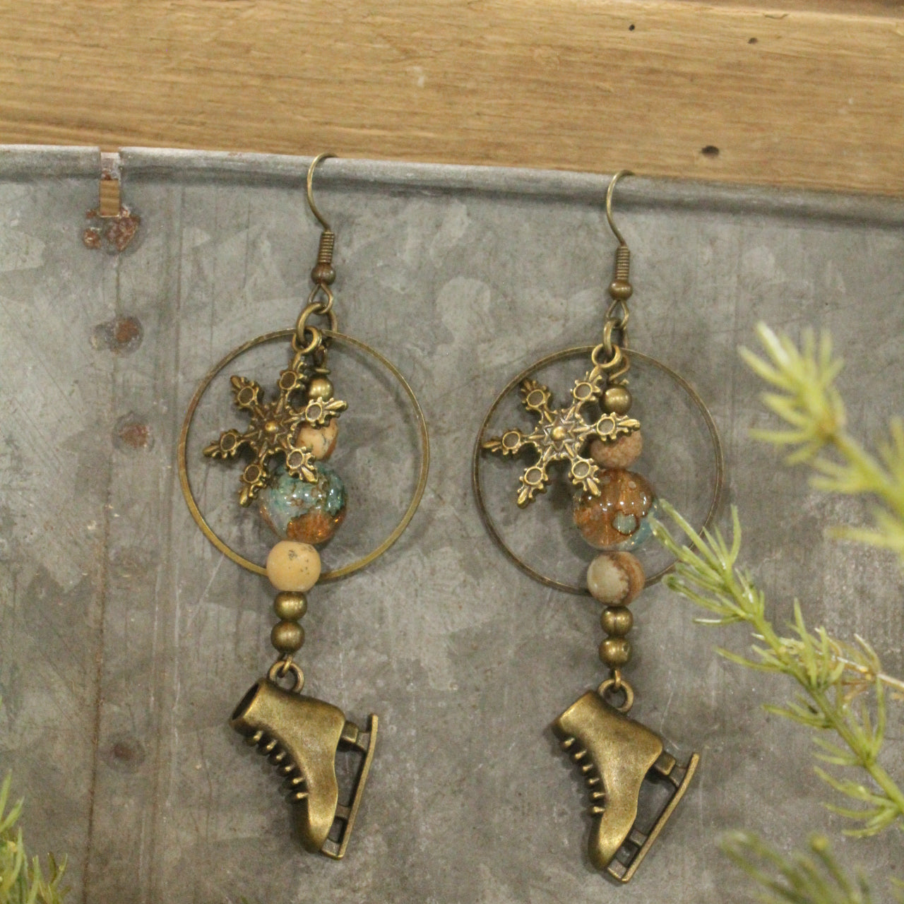 Ice Skating In The Snow Bronze Dangle Earrings