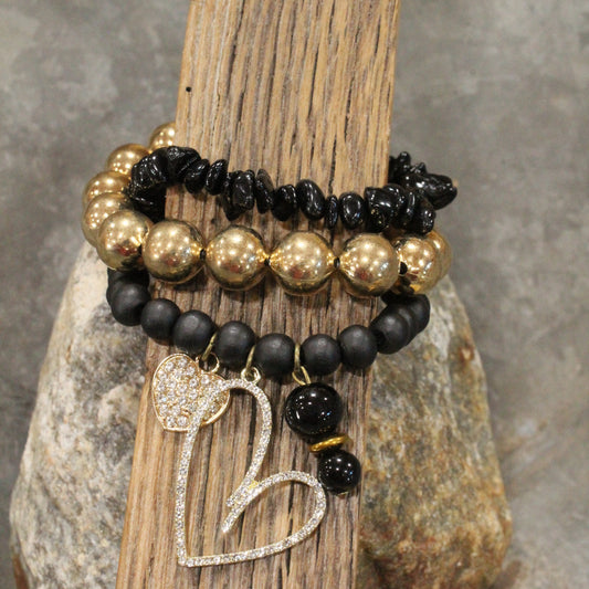 Richness & Elegance All Wrapped Up In One Heart Charm'd Bracelet Set