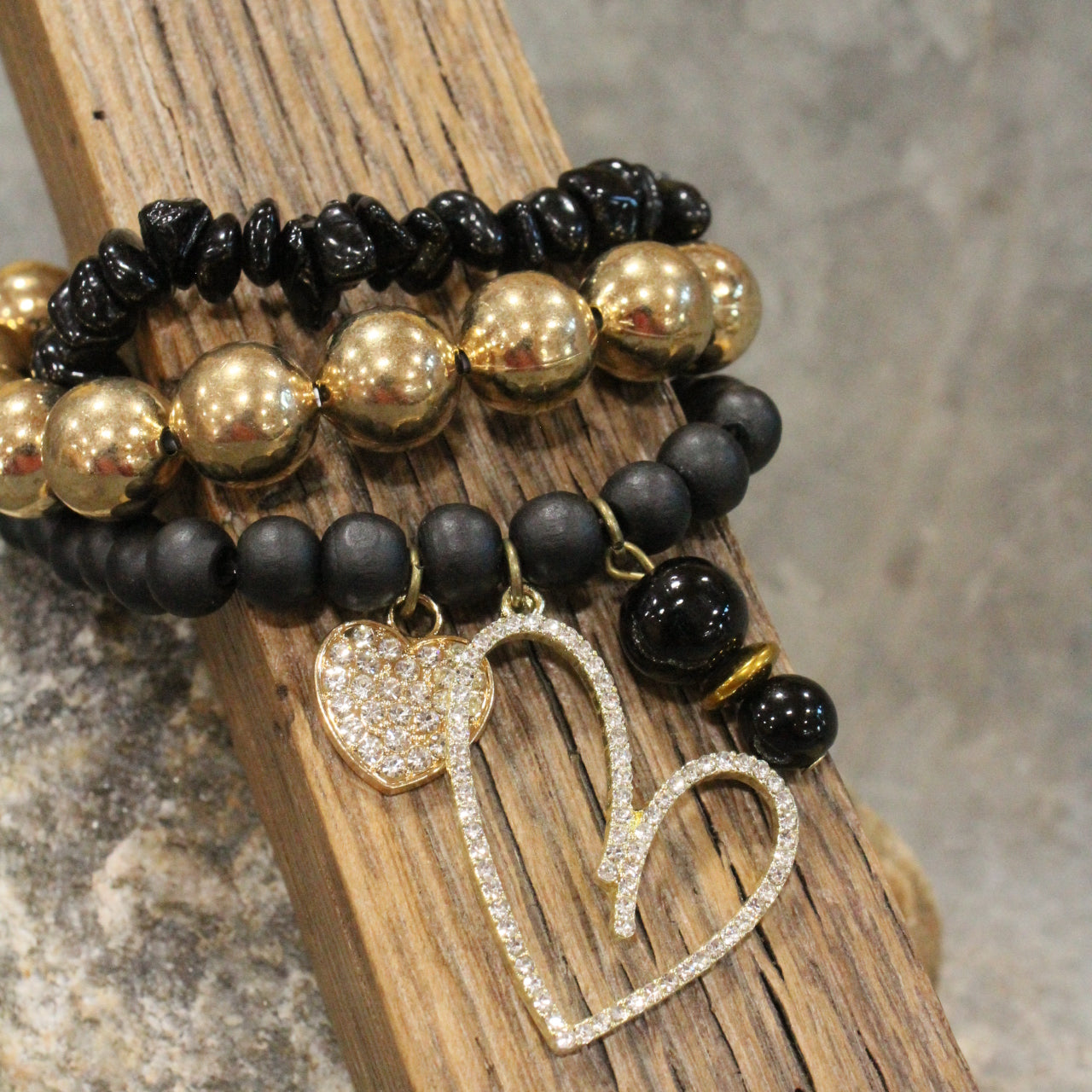 Richness & Elegance All Wrapped Up In One Heart Charm'd Bracelet Set