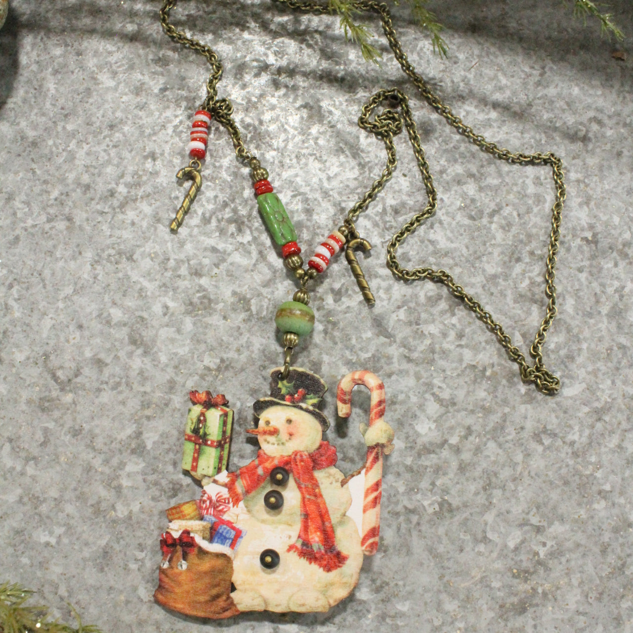 Snowman W/ His Candy Cane & Packages Charm Necklace