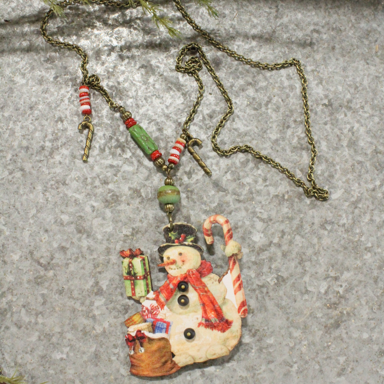 Snowman W/ His Candy Cane & Packages Charm Necklace