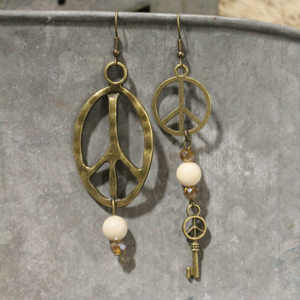 Pleasingly Peace Ivory Dangle Earrings