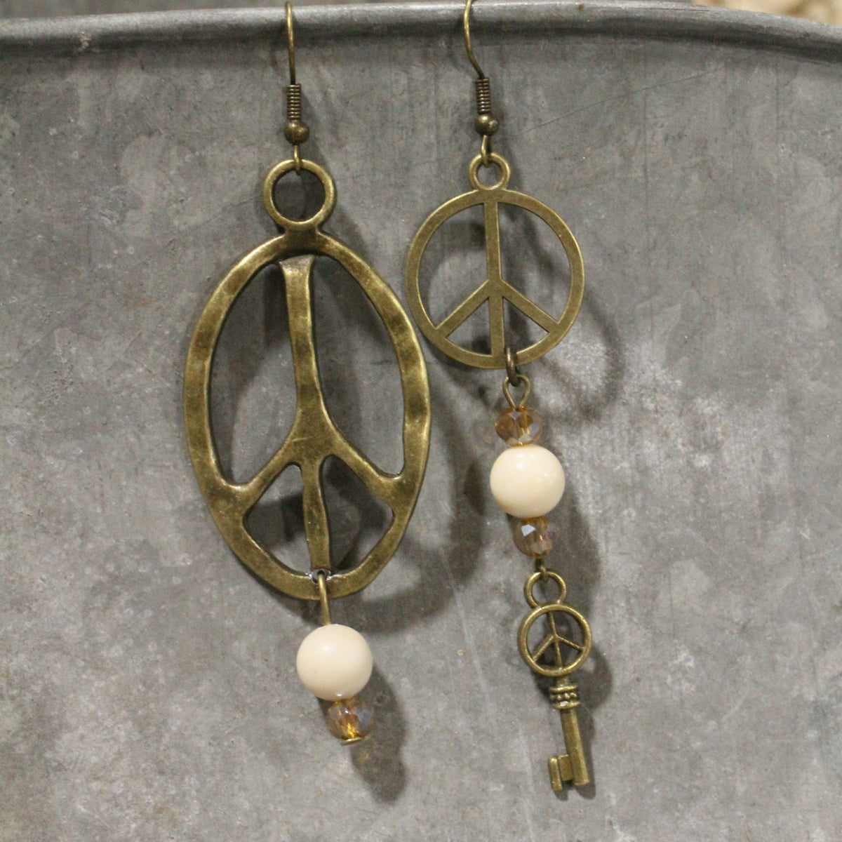 Pleasingly Peace Ivory Dangle Earrings