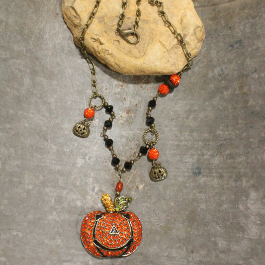 Check Out This Bling Jack-O-Lantern Necklace