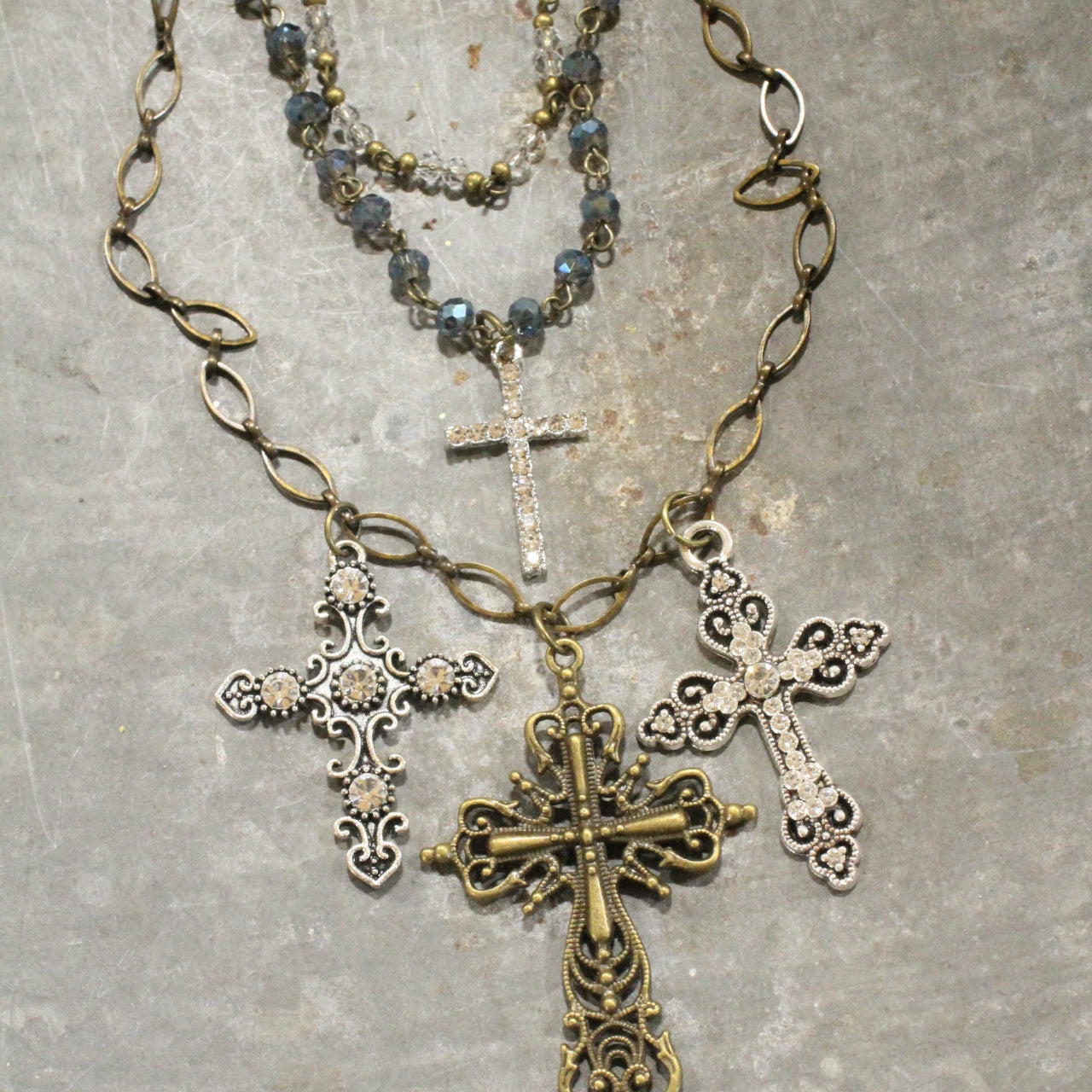 Layered Rosary Chains & Mixed Metal Cross Charmers Necklace