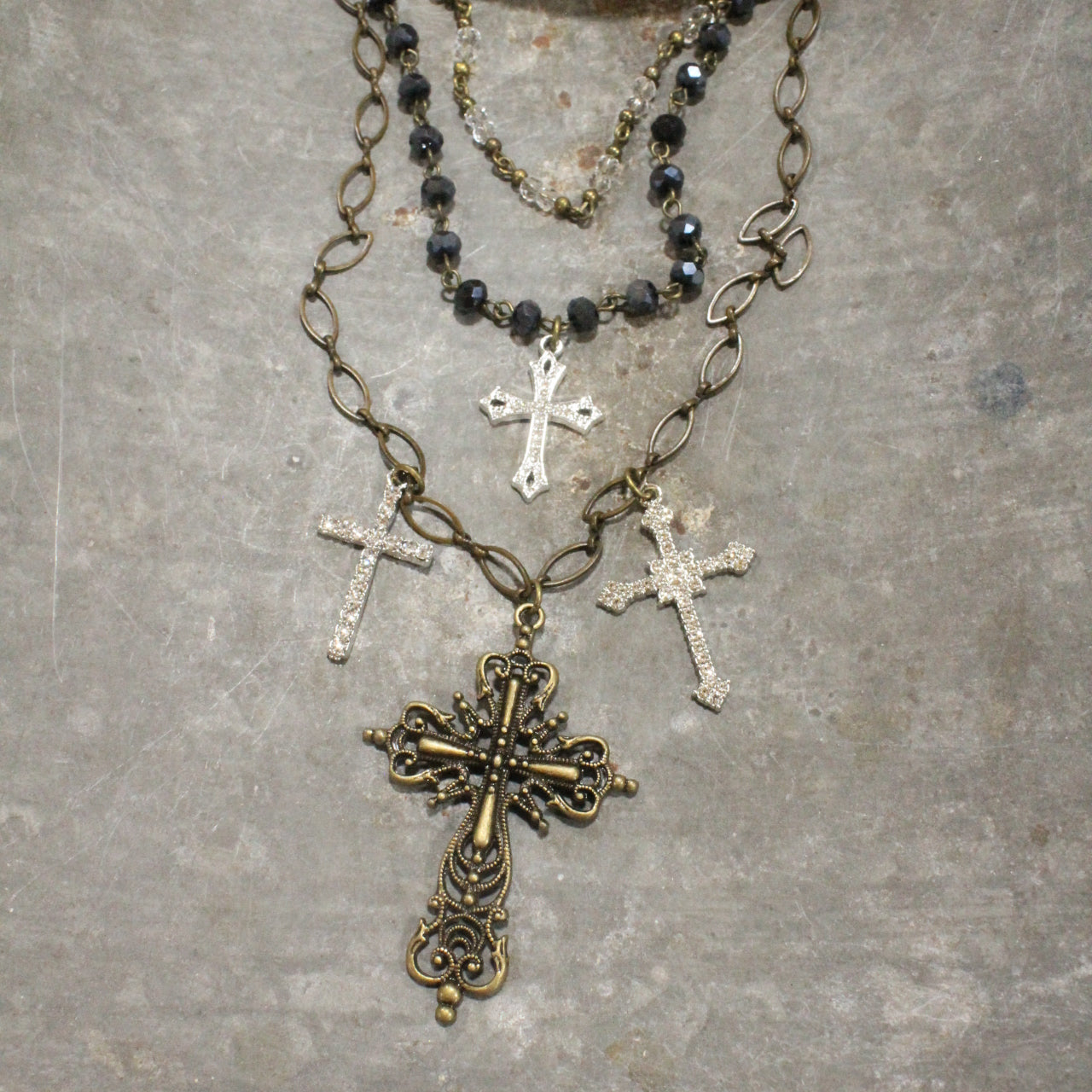 Layered Rosary Chains & Mixed Metal Cross Charmers Necklace